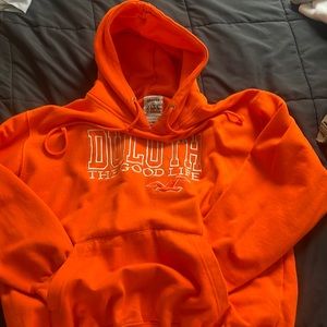 Medium , orange, Duluth Minnesota sweatshirt. Worn once. Too small for me